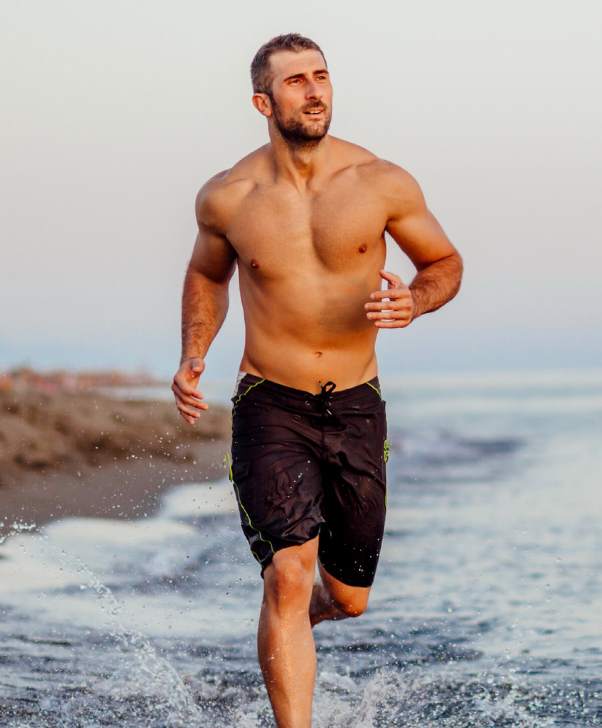 sarasota gynecomastia surgery model running by the water